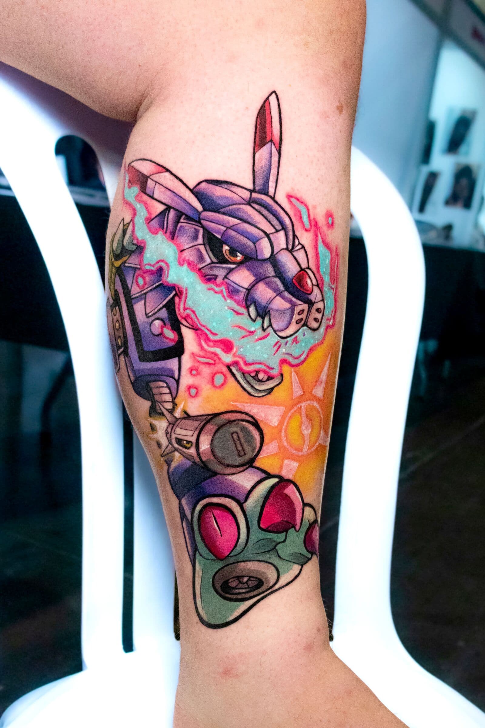 Mecha, farbig, Tattoo am Unterarm